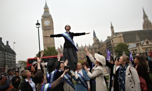 Campaigners, some dressed as suffragettes, attend a rally organised by UK Feminista to call for equa